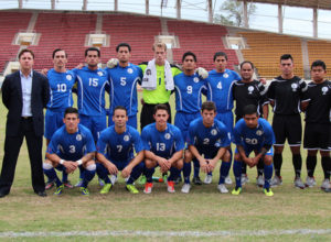 The Matao's starting 11 players pose for a group photo with Matao staff before the start of its FIFA international friendly match against Laos. Back row, from left to right: Asst. Coach Jimmy Okuhama, Head Coach Gary White, Jason Cunliffe, Shawn Nicklaw, Travis Nicklaw, Doug Herrick, Ian Mariano, Micah Paulino, Team Manager Joe Roberto, Asst. Coach Dominic Gadia, Equipment Manager Julius Campos and Team Physiotherapist Ian Lawton. Front row, from left to right: Jonahan Romero, John Matkin, Ryan Guy, Erik Ustruck and A.J. DeLaGarza. Guam drew 1-1 with Laos.