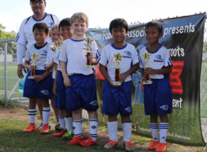 The Bulldogs pose with their U8 division championship trophies of the Guam Football Association 3v3 Grassroots Tournament at the GFA National Training Center. The Bulldogs defeated the Marauders 4-1 in the final to win their third-straight championship.