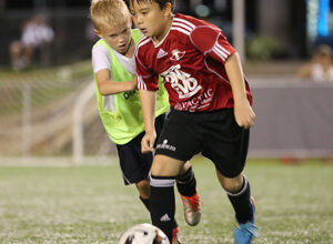 The Wings FC's Rintaro Nishioka races to the goal against the Paintco Strykers during the U10 championship match of the Guam Football Association U8 & U10 Youth Tournament at the GFA National Training Center Saturday. The Wings team went on to win the U10 championship.