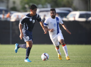 Guam's Ian Mariano moves to the goal with the ball ahead of India's Cavin Peter Lobo during a 2018 FIFA World Cup Russia and AFC Asian Cup UAE 2019 Joint Qualification Round 2 match at the Guam Football Association National Training Center Tuesday. Guam defeated India 2-1.